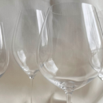Four wine glasses side by side showing differences in bowl and size